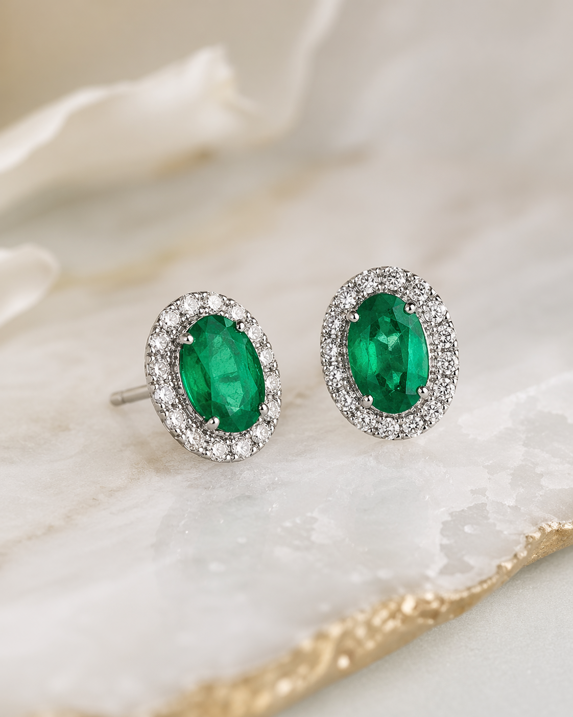 Oval Emerald Diamond Stud Earrings in White Gold
